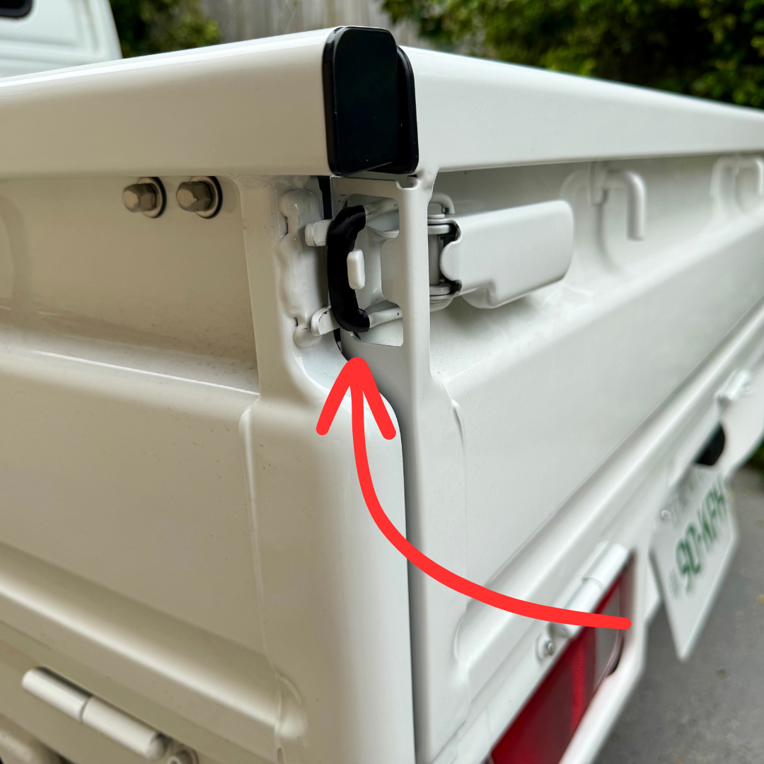 Black Honda Acty Kei Truck Bed Latch Protectors on rear latch