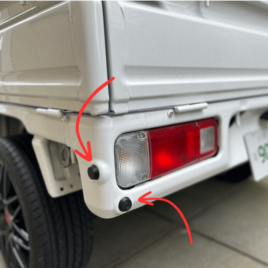 3d printed honda acty bed stoppers, fitted to a white honda acty
