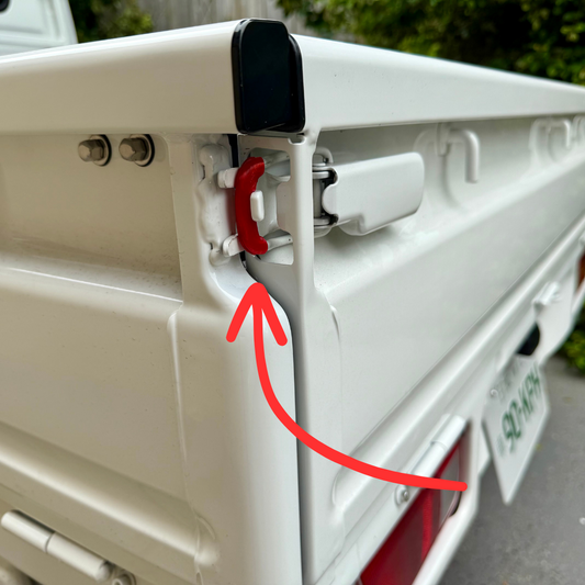 Red Honda Acty Kei Truck Bed Latch Protectors on rear latch